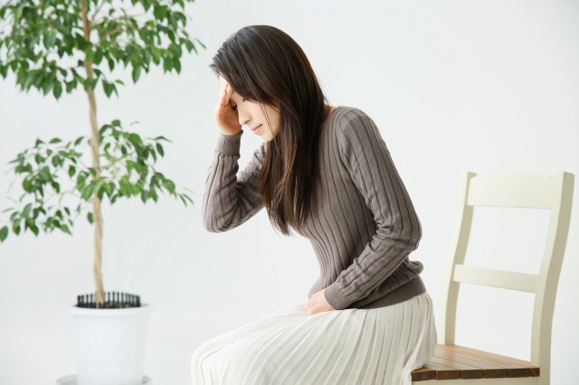 具合の悪そうな女性